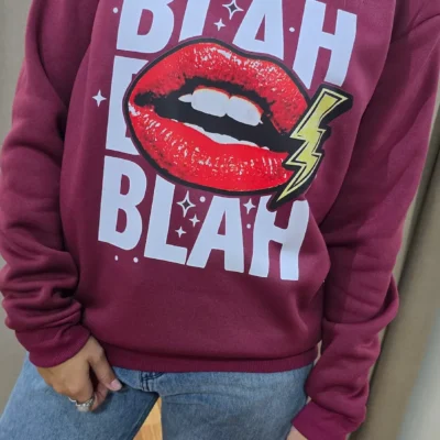 buzo bordo blah blah blah mujer